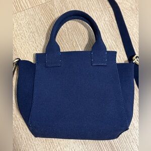 Rothy’s mini bag in navy blue